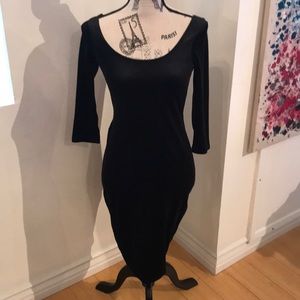 Velvet black cocktail dress with bow in back
